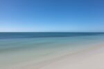 Witness the Atlantic Ocean at its calmest during midday at Bahia Honda State Park, captured to perfection in this elegant and minimalistic artwork.