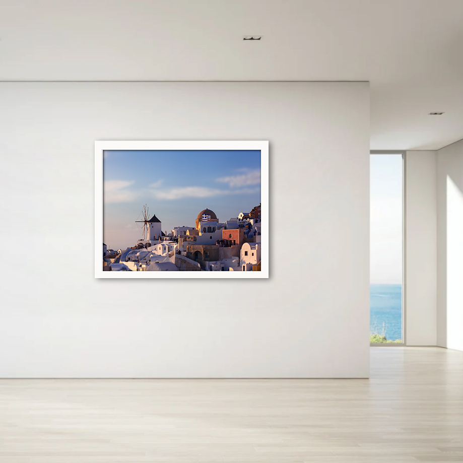 Set against the ethereal backdrop of the Aegean Sea, the town of Oia in Santorini paints a picture of Grecian allure. The dominant windmill, an emblem of the island’s history, stands proudly amidst the cascading whitewashed buildings.