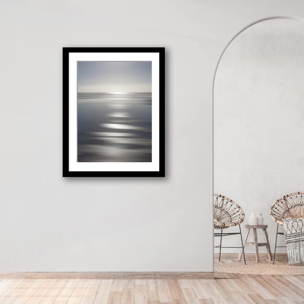 Dive into the mesmerizing canvas where the sun paints intense silver patterns across the Oregon sands and distant waves.