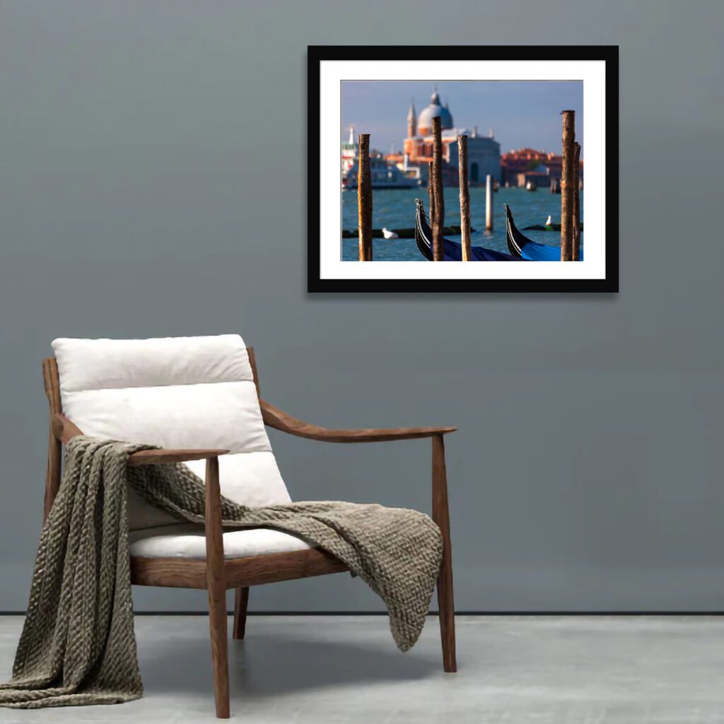 Venetian gondola with historic basilicas in background